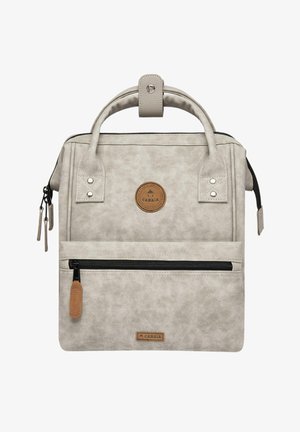 Gray faux leather backpack with a top handle, front zippered pocket, and circular logo patch. Features smooth texture and contrasting hardware accents.