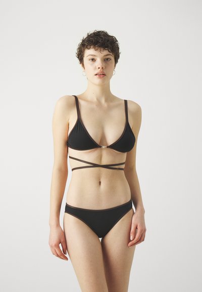 Black bikini set featuring a triangle top with thin straps and a crossband design. The material is smooth with contrast accents.