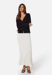 Bubbleroom KNITTED TRUMPET SLEEVE CARDIGAN - Kardigan - black