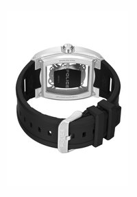 Ročna ura iz nerjavečega jekla s črnim gumijastim paščkom, kvadratnim številčnikom, prozornim uporabilnikom, zobniškimi detajli in napisom "POLICE" na zaponki.