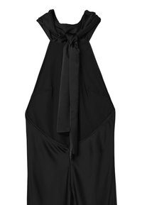 Combinaison noire à bretelles nouées, fabriquée en tissu lisse. Arborant un design sans manches et une fermeture éclair au dos.