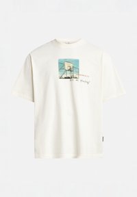 White cotton t-shirt featuring a square graphic of a basketball hoop with a blue sky background and text "Are we playing?" beneath it.