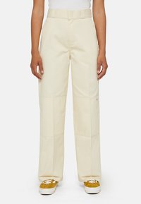 Beige wijde broek gemaakt van een katoenmix, met een hoge taille, gestikte panelen en een subtiele logopatch aan de zijkant.