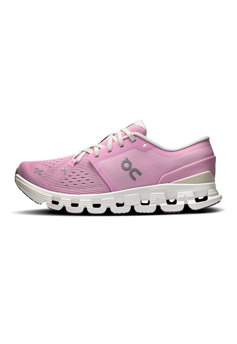 Pink running shoe with a mesh upper, white accents, and a segmented sole for cushioning. Features minimal branding and lace-up design.