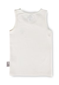 White sleeveless tank top made of soft cotton. Features a round neck, smooth texture, and a small brand tag on the side.