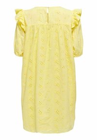 Robe jaune à manches courtes, coupe ample, manches à volants, motif œillet et fermeture goutte d'eau à l'arrière. Texture de tissu douce.