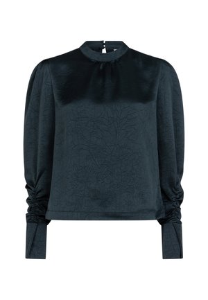 Donkergroene blouse met een hoge halslijn, lange pofmouwen, textuurstof en gerimpelde details bij de manchetten en de zoom.
