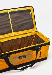 The North Face BASE CAMP GEAR BOX L - Kelioninis krepšys - summit gold/black