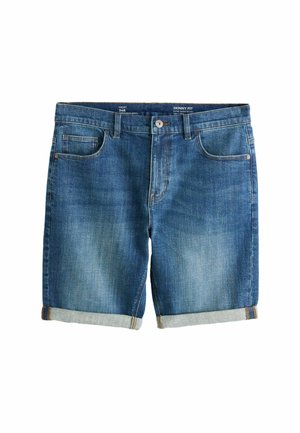 Modré rifľové krátke nohavice s úzkym strihom, vyhrnutými lemami, zapínaním na predné gombíky, opaskovými priechodkami a piatimi vreckami na bielom pozadí.