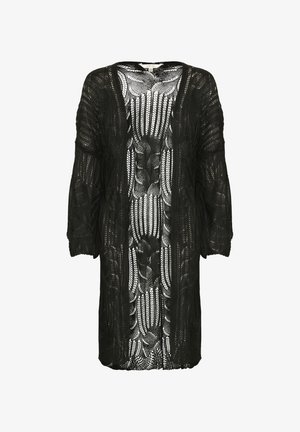 Cardigan noir ouvert en dentelle avec un motif floral. Il possède des manches trois-quarts et une coupe décontractée, créant une silhouette fluide.