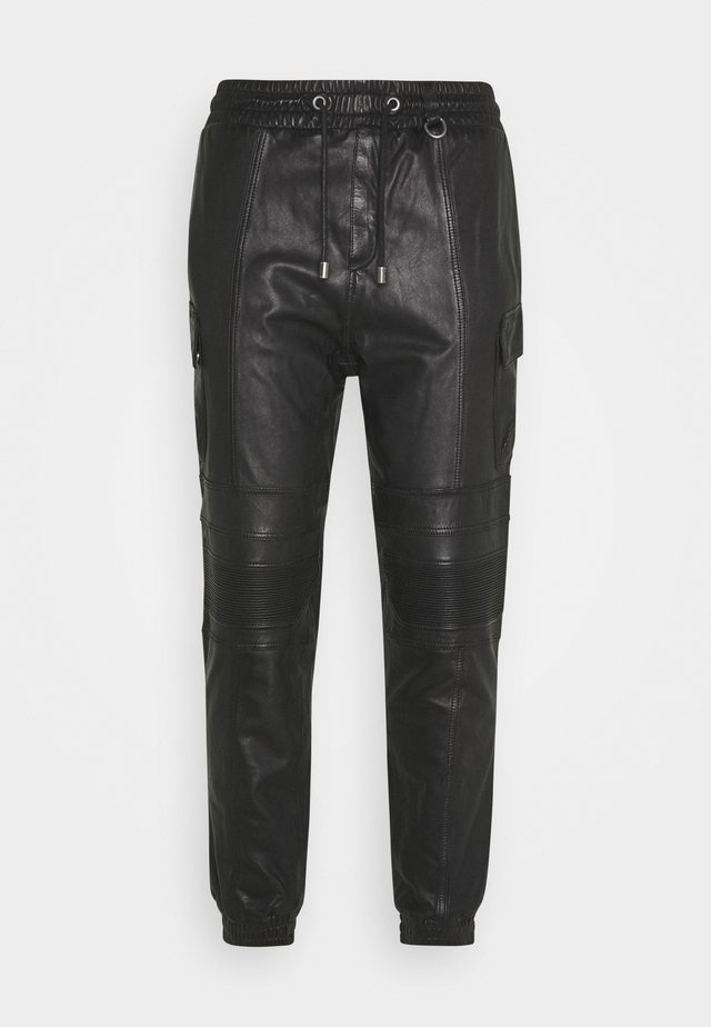 RADY - Leather trousers - black