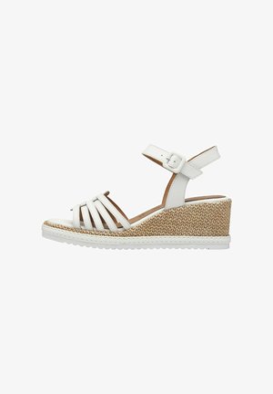 White wedge sandal with braided jute texture, adjustable ankle strap, and open-toe design. Features multiple thin front straps for support.