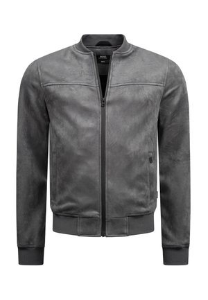 Grå ruskind bomberjakke med ribstrikkede manchetter og linning, lynlås foran og minimalistiske sømdetaljer over brystet.