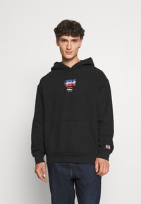 Levi's® RELAXED GRAPHIC - Sweatshirt com capuz - black