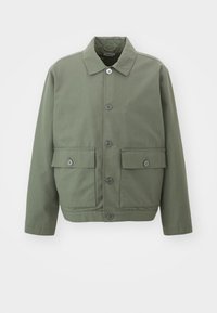 Grön bomulljacka med krage, framknäppning med knappar och två fickor med lock. Snygg yta och skräddarsydd, fyrkantig passform.