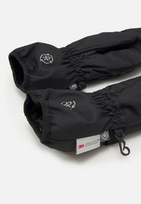 Black insulated gloves with elastic openings, 3M Thinsulate lining, and a textured exterior. Includes a loop for attachment.