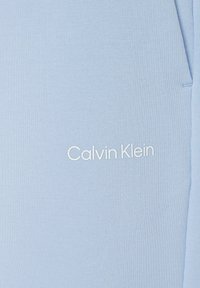 Calvin Klein MICRO LOGO REPREVE - Pantalones deportivos - bleu