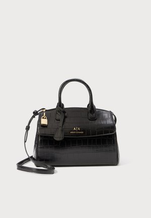 Czarna torebka wykonana z fakturowanej sztucznej skóry krokodyla. Posiada podwójne uchwyty, odpinany pasek na ramię, złote okucia oraz akcent w postaci kłódki.