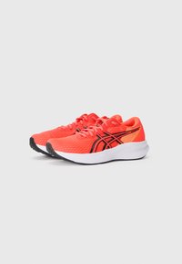 Bright orange running shoes with a mesh upper, black accents, and a white midsole. Features textured surface and reinforced heel.