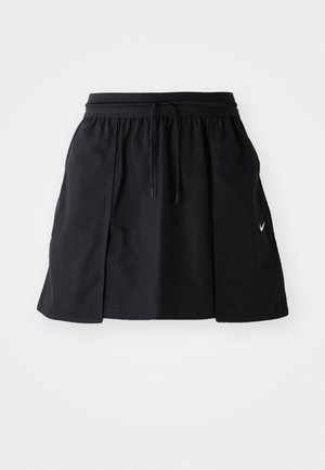Saia desportiva preta com cintura elástica e cordão ajustável. Apresenta fendas laterais, tecido leve e um pequeno logótipo na bainha.