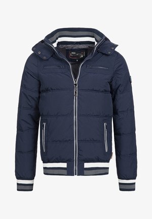 Navy padded jacket with a hood, zip front, two chest pockets, and striped ribbed cuffs and hem. Smooth texture and quilted design.