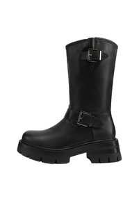 Stivale alla caviglia in pelle nera con suola spessa, fibbie laterali e una finitura liscia. Presenta una punta arrotondata e un design di altezza media sulla polpACC. Stile elegante e versatile.