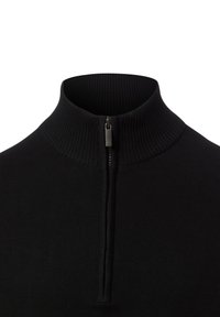 Schwarzer Pullover mit hohem Kragen und Frontreißverschluss. Hergestellt aus weichem Stoff mit gerippter Struktur rund um den Kragen und den Reißverschluss.