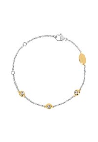 Pulsera de cadena de plata con tres engastes de oro, cada uno sosteniendo una piedra preciosa transparente, y una etiqueta ovalada de oro cerca del cierre grabada con "BREIL."