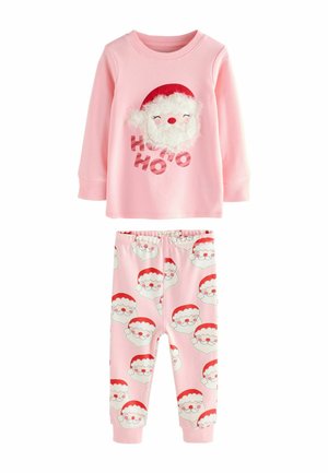 Pink pajama set featuring a long-sleeve top with a fluffy Santa face and the text "HO HO HO," paired with pink pants adorned with repeated Santa faces.