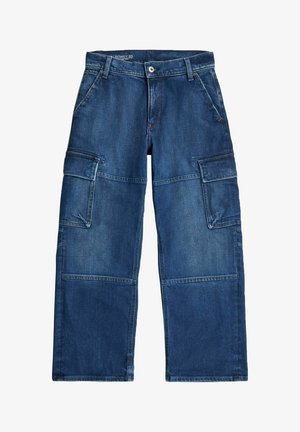 Niebieskie spodnie typu cargo z denimu z wieloma kieszeniami, zapinane na guziki, z szlufkami na pasek i wzmocnionymi szwami na kolanach.