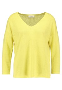 Maglione giallo a maniche lunghe con scollatura a V, dal fit rilassato e un sottile motivo a maglia, etichettato "Zalando Essentials" all'interno del colletto.