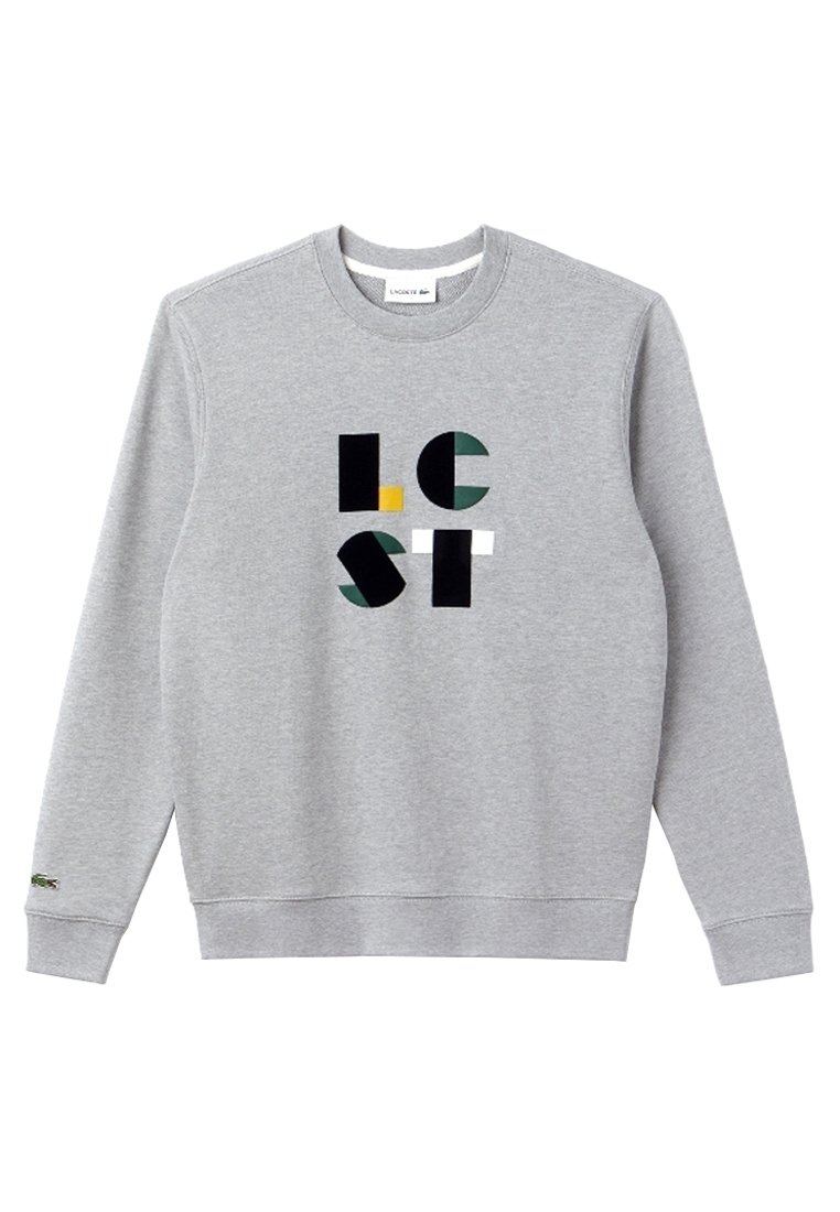 Sweat-shirt gris en matériau doux arborant un motif graphique multicolore formant le mot "LOST" dans différentes polices et formes.