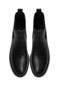 Stivali alla caviglia in pelle nera con pannelli elastici ai lati, punta arrotondata e linguetta sul tallone; texture liscia e design elegante.