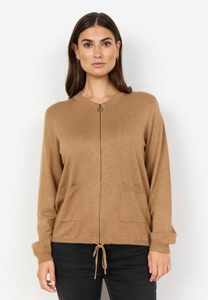 Cardigan a maglia marrone con maniche lunghe, zip frontale, due tasche frontali e cordino regolabile all'orlo. Texture morbida e vestibilità comoda.
