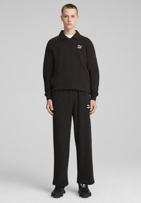 Puma RELAXED TRACK PANTS - Tepláky - black black