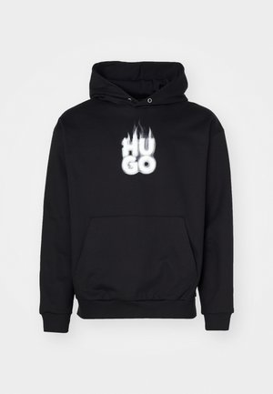 Black hoodie with a front kangaroo pocket and ribbed cuffs. Features a white flame-styled "HUGO" logo on the chest. Cotton blend material.