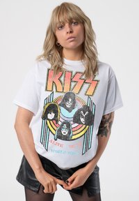 White cotton T-shirt featuring a graphic design of the band KISS with colorful text and imagery, short sleeves, and a relaxed fit.