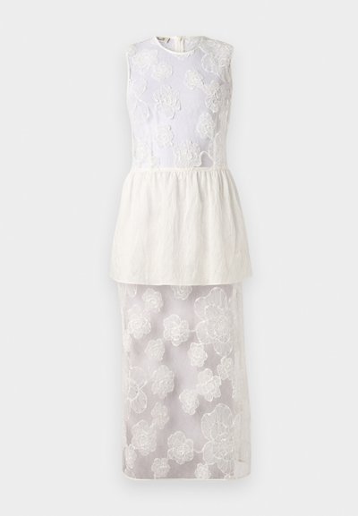 Witte jurk met mouwloze top met bloemenborduursel, gelaagde peplum taille en een doorschijnende onderrok versierd met bloemmotieven.