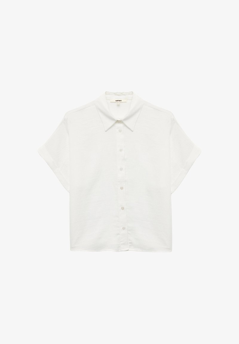 White short-sleeve shirt with a collared neckline, featuring a buttoned front placket and a smooth, lightweight fabric.