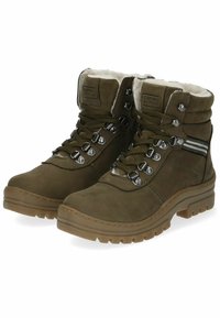 Braune Wildleder-Wanderschuhe mit einem mit Fell gefütterten Kragen, Metall-Ösen und schwarz-weißen Streifenakzenten an der Seite. Robuste Gummisohle.