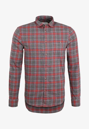 Red and gray plaid flannel shirt with long sleeves, button-down collar, and curved hem. Features buttons and a soft, textured fabric.