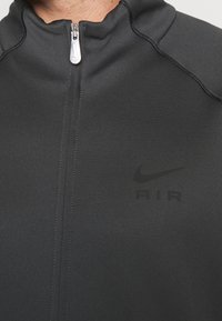 Nike Sportswear Verryttelytakki - mottled dark grey