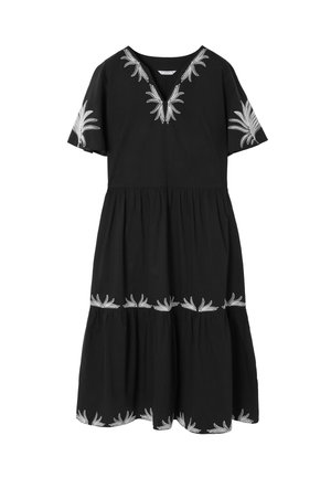 Black cotton dress with short sleeves, V-neck, and white floral embroidery along the neckline and hem, featuring a tiered skirt design.