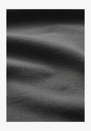 Dark gray fabric with a smooth, textured surface. The material has a slight stretch and visible knit pattern, creating soft ripples.