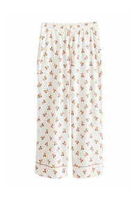 White pajama pants featuring a repeating teddy bear pattern in orange-brown, with an elastic waistband and brown trim at the cuffs.
