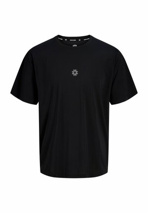 T-shirt noir à manches courtes avec un petit motif géométrique blanc symétrique au centre de la poitrine et un col rond.