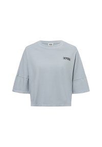 Lichtblauw T-shirt met korte mouwen, gemaakt van zachte stof en met een losse pasvorm. Het heeft een ronde halslijn en de merknaam "DRYKORN" geborduurd in het zwart.