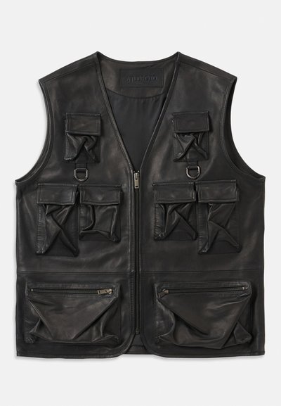 Black leather vest with multiple flap and zippered pockets, front zipper closure, and D-ring details on upper chest.