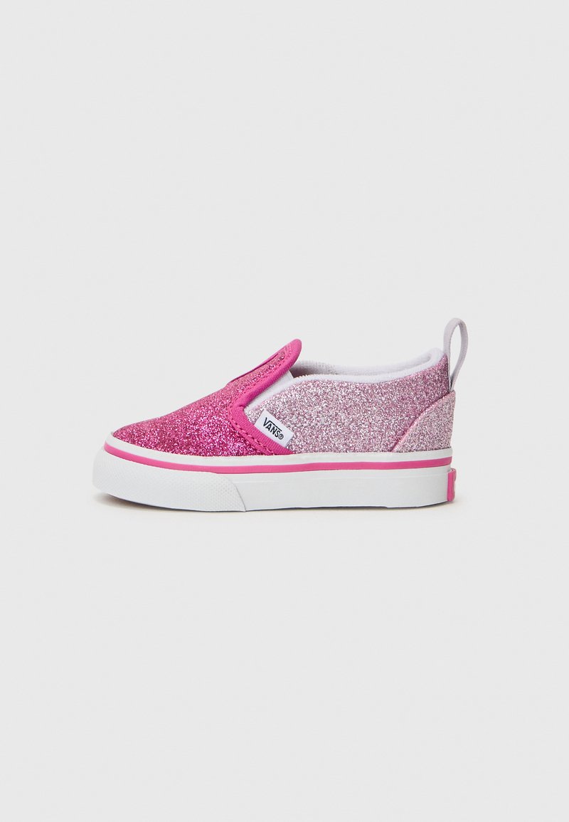 Baskets à enfiler avec un dégradé de paillettes roses, une semelle en caoutchouc blanche et des accents roses. Le design comprend un col rembourré et une étiquette.