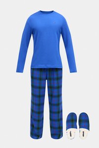 Blue long-sleeve top, plaid pajama pants in blue, green, and red, and matching blue slippers with white lining. Soft fabric and relaxed fit.